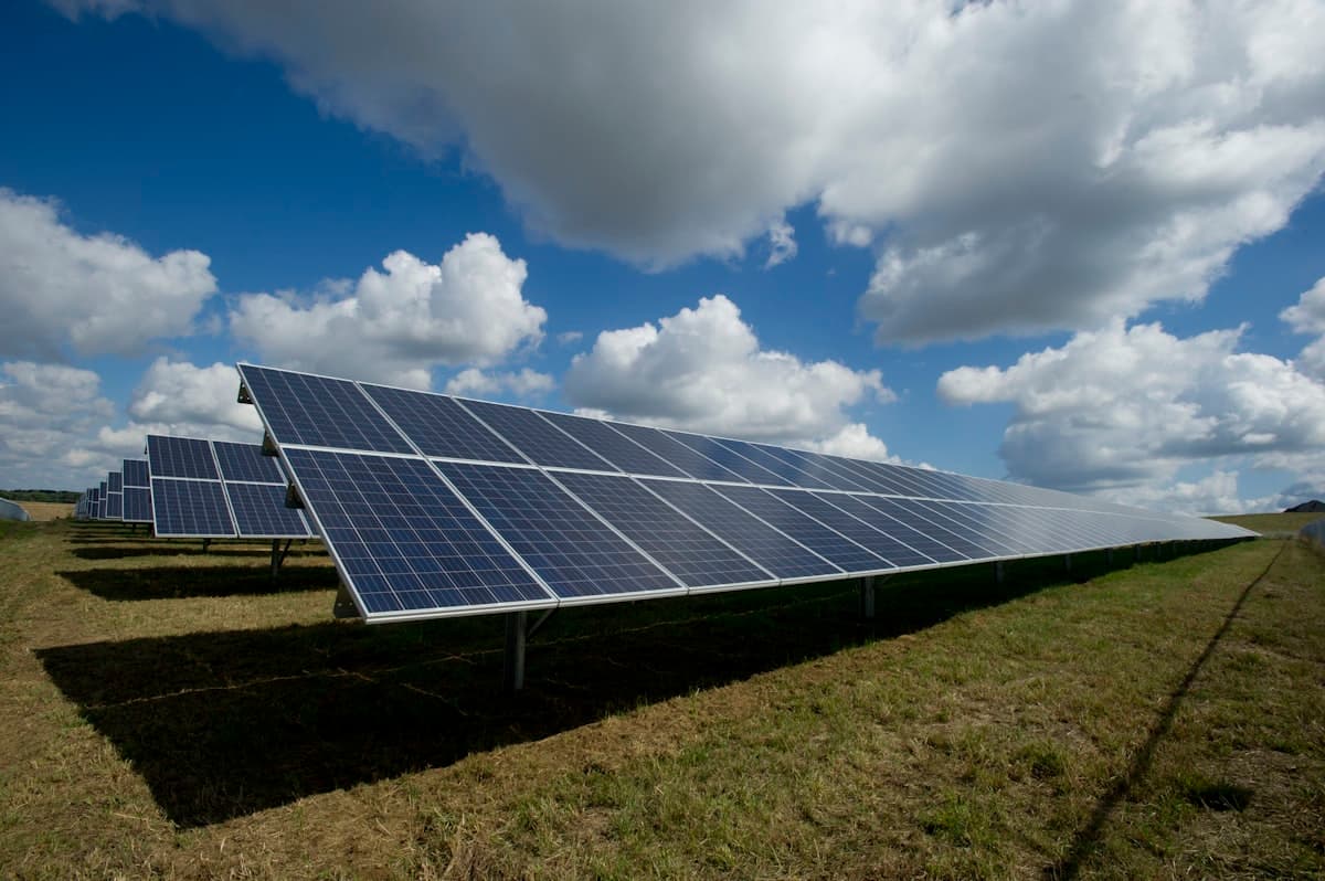Solar panels in a renewable energy installation at sunset
